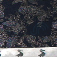 Sleeve: Balinese batik napkin trimmed with grandmother's table runner from Guatamala